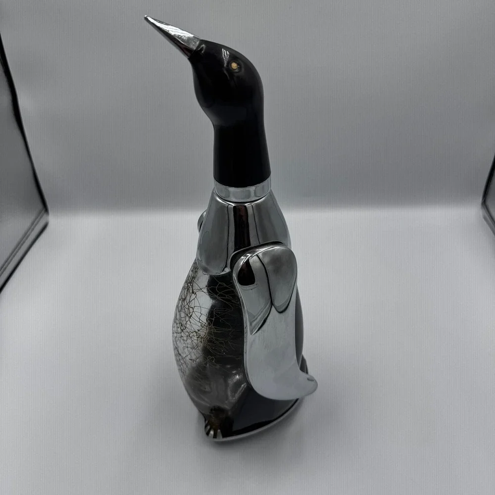 PENGUIN BOTTLE DECANTER MUSIC BOX PLAYS 